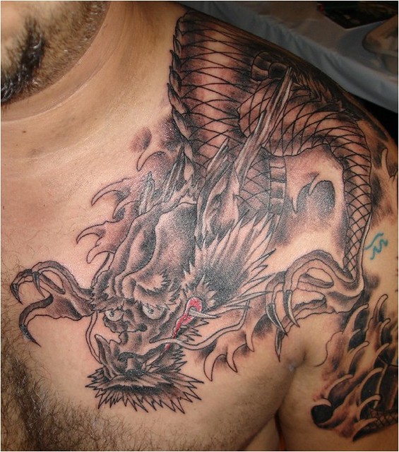 a tattoo on a man's chest