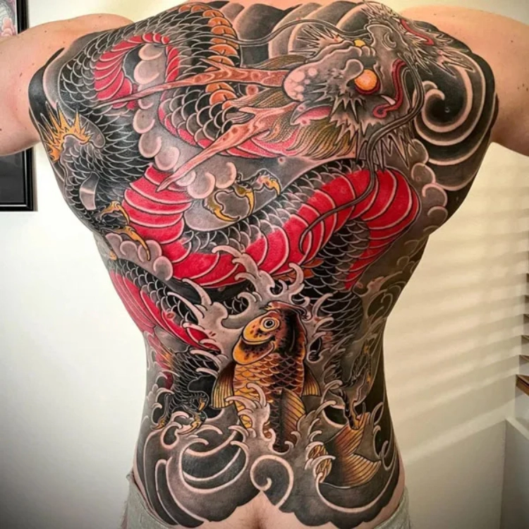 a back of a man with a tattoo